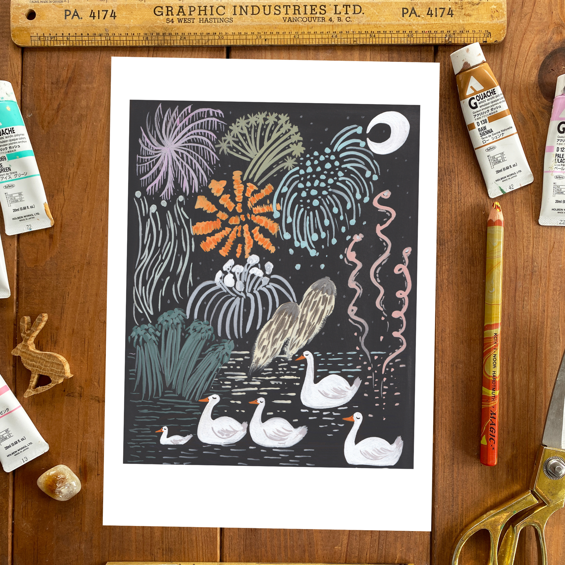 Illustration of swans and underwater plants on a wooden surface with art supplies.
