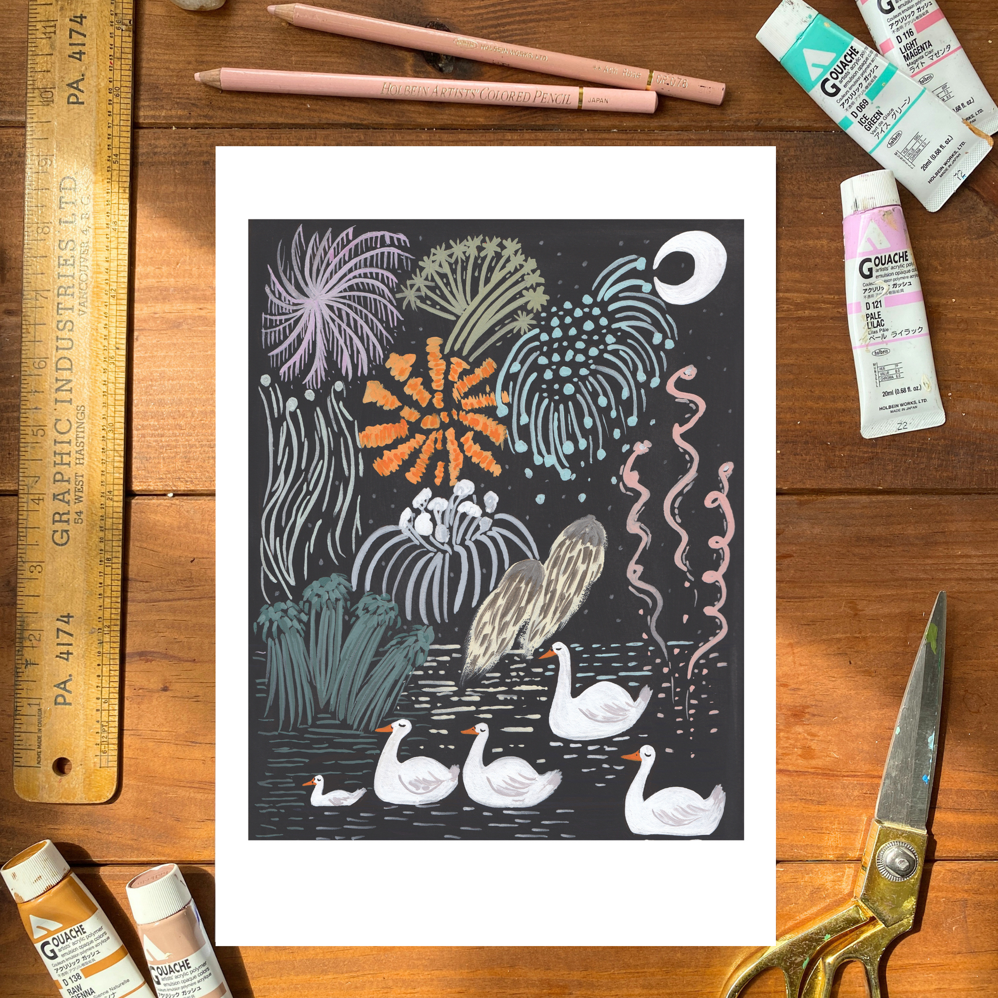Illustration of swans and underwater plants on a wooden surface with art supplies.