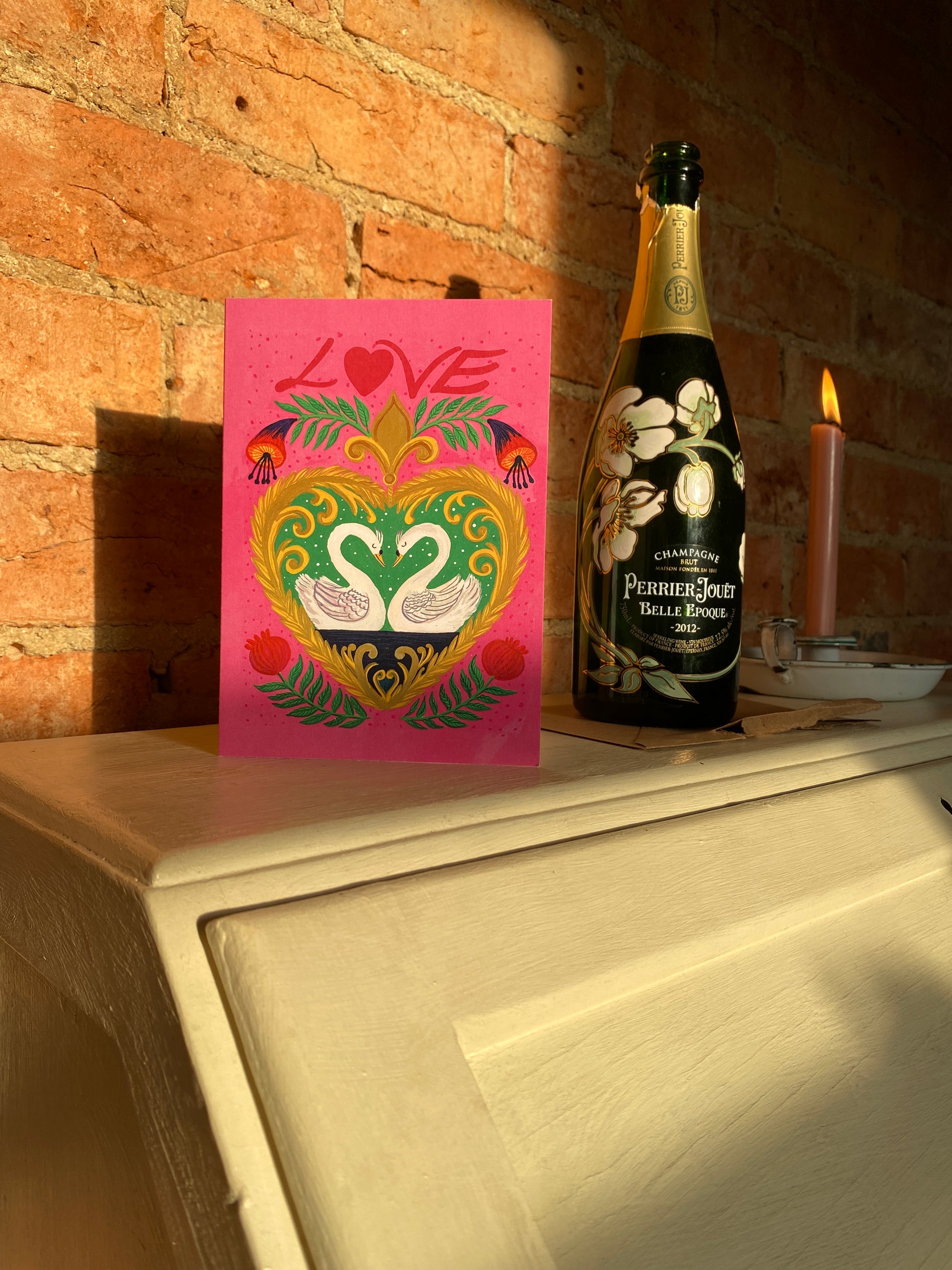 Queer-friendly romantic greeting card with ornate detailing, wildlife motif, and symbolic fruit for meaningful occasions