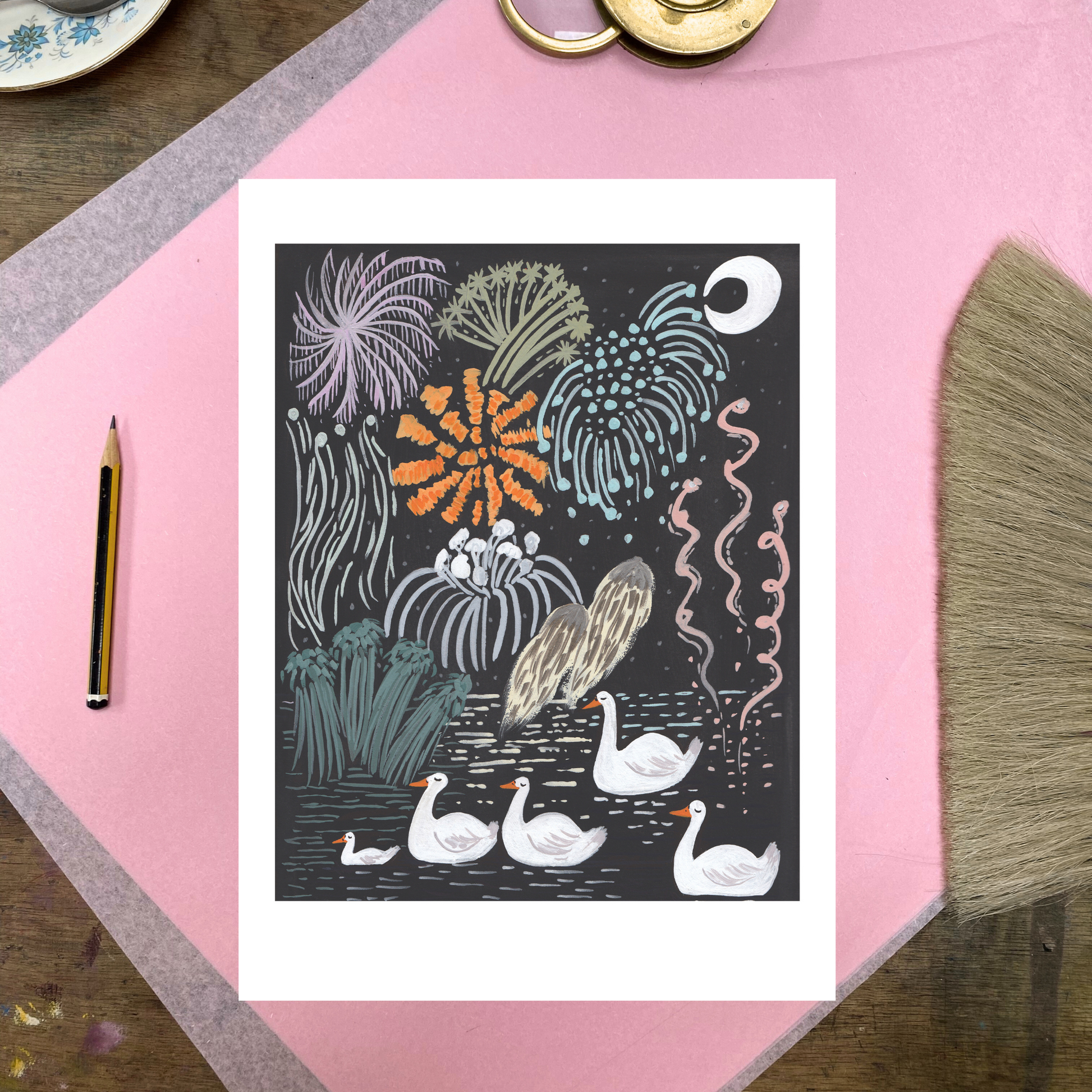 Wall art with nature-themed design featuring birds and plants on a pink surface.
