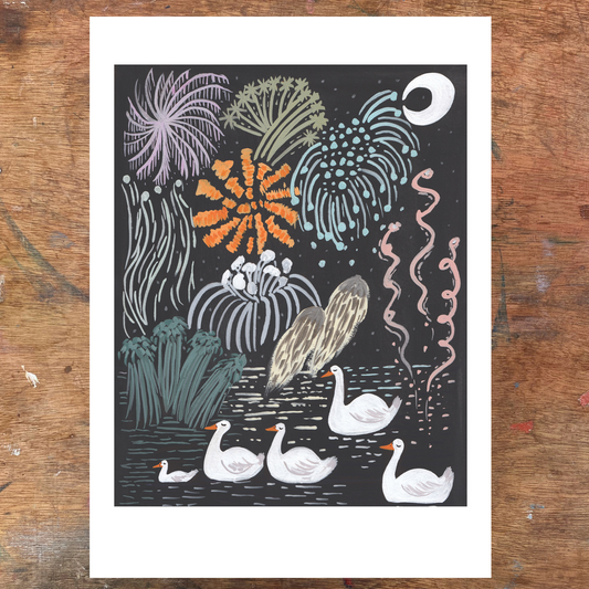 Illustration of geese and fireworks on a dark background, framed in white on a wooden surface.